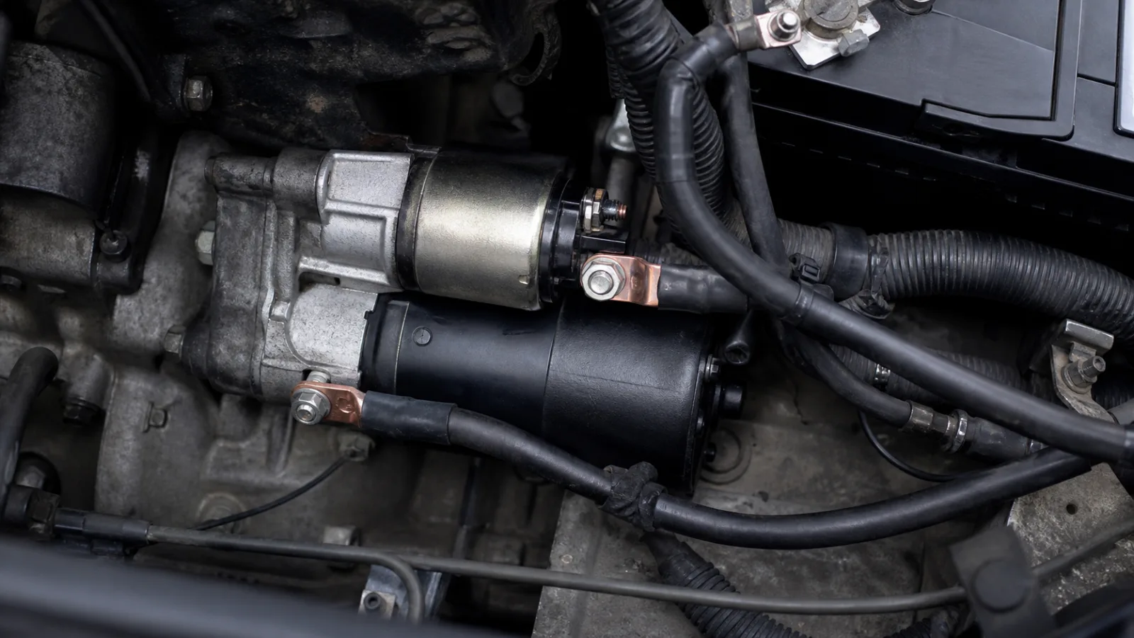 Engine starting cable and battery harness assembly